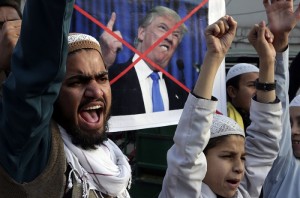 Pakistani religious students protest against U.S. President Donald Trump in Lahore, Pakistan, Friday, Jan 5, 2018. A senior Pakistani senator has expressed disappointment at the U.S. decision to suspend military aid to Islamabad, saying it will be detrimental to Pakistani-U.S. relations. Nuzhat Sadiq, the chairwoman of the Senate Foreign Affairs committee in the upper house of parliament, says Islamabad can manage without the United States as it did in the 1990s, but would prefer to move the troubled relationship forward.(AP Photo/K.M. Chaudary)