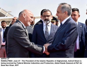 APP01-27 RAWALPINDI: June 27 - The President of the Islamic Republic of Afghanistan, Ashraf Ghani is being received by Federal Minister Industries and Production, Abdul Razak Dawood at PAF Air Base Nur Khan. APP