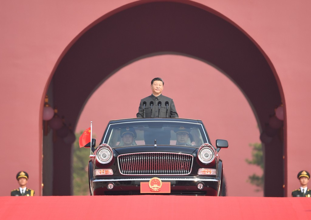 (191001) -- BEIJING, Oct. 1, 2019 (Xinhua) -- Chinese President Xi Jinping, also general secretary of the Communist Party of China (CPC) Central Committee and chairman of the Central Military Commission, is ready for a National Day review of the armed forces as a limousine carrying him drives out of the Tian'anmen Rostrum during the celebrations for the 70th anniversary of the founding of the People's Republic of China in Beijing, capital of China, Oct. 1, 2019. (Xinhua/Yan Yan) Xinhua News Agency / eyevine Contact eyevine for more information about using this image: T: +44 (0) 20 8709 8709 E: info@eyevine.com http://www.eyevine.com