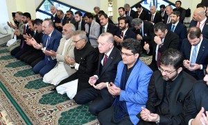 Turkish President Tayyip Erdogan along with Pakistan's President Arif Alvi hold palms as they attend Friday prayers at the President House in Islamabad, Pakistan February 14, 2020. Press Information Department (PID) Handout via REUTERS/ATTENTION EDITORS - THIS PICTURE WAS PROVIDED BY A THIRD PARTY.
