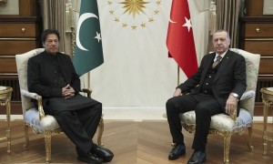 Turkey's President Recep Tayyip Erdogan, right, and Pakistan's Prime Minister Imran Khan pose for the media before a meeting, in Ankara, Turkey, Friday, Jan. 4, 2019. The two expected to discuss bilateral and regional issues. (Presidential Press Service via AP, Pool)