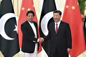 BEIJING, CHINA - APRIL 28: China's President Xi Jinping, right, shakes hands with Pakistan's Prime Minister Imran Khan before a meeting at the Great Hall of the People on April 28, 2019 in Beijing, China. (Photo by Madoka Ikegami-Pool/Getty Images)